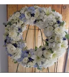 jazmine wreath. An arrangement by Geni's Florist and Gifts.