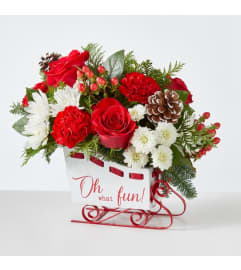 FTD Sleigh Bells. An arrangement by Pierson's Flower Shop and Greenhouses.