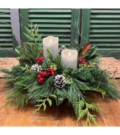 Winter Whispers Candlelight Bouquet. An arrangement by Forest Florist.