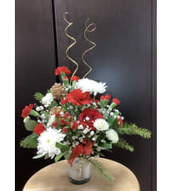 Christmas Angel. An arrangement by Roma Flowers and Gifts.