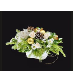Peaceful Sleigh. An arrangement by Hillcrest Florist.