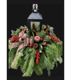 Hillcrest Lantern Centrepiece. An arrangement by Hillcrest Florist.