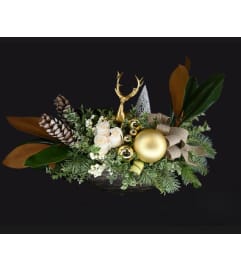 Golden Winter Bloom Centrepiece. An arrangement by Hillcrest Florist.
