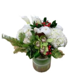 Festive Elegance. An arrangement by Hillcrest Florist. Festive Elegance. An arrangement by Hillcrest Florist.