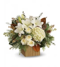 Christmas Snowy Woods Bouquet. An arrangement by Cantutas Florist.