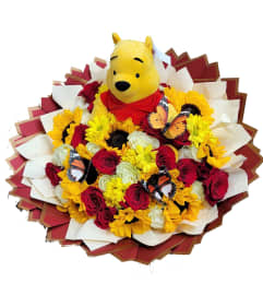 Golden Hug Garden. An arrangement by Vemongi Flowers.