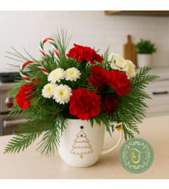 Christmas Cheer Mug Arrangement (Mug Design may Vary). An arrangement by Roma James Gifts. Christmas Cheer Mug Arrangement (Mug Design may Vary). An arrangement by Roma James Gifts.