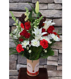 Reindeer Holiday Bouquet. An arrangement by Sonia's Florist. Reindeer Holiday Bouquet. An arrangement by Sonia's Florist.