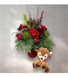 Prancer's Pomegranate Arrangement. An arrangement by In Bloom.