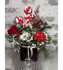 Candy Cane Rose Delight. An arrangement by Kelly Ann's Floral.