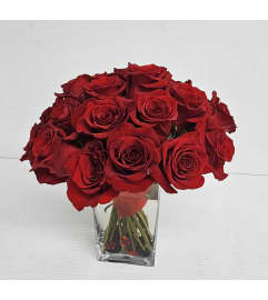 Spicy Red Roses. An arrangement by Brickell Exclusive Blooms. Spicy Red Roses. An arrangement by Brickell Exclusive Blooms.