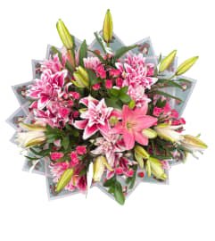Blush Lily Embrace. An arrangement by Vemongi Flowers.
