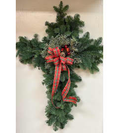 Fresh Evergreen Cross Stand. An arrangement by Sunny Day Blossoms Design Studio.