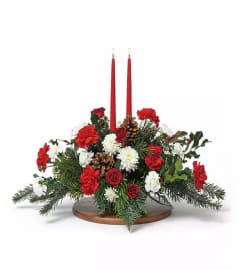 Teleflora's holiday arrangement in a keepsake dish. An arrangement by Nicol Florist. Teleflora's holiday arrangement in a keepsake dish. An arrangement by Nicol Florist.
