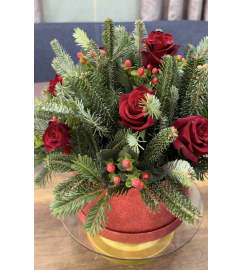 Christmas Rose Harmony Special. An arrangement by Geni's Florist and Gifts.