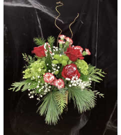 Candy Cane Delight. An arrangement by Roma Flowers and Gifts.