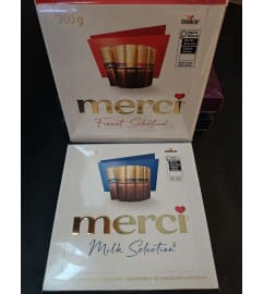 Merci. An arrangement by KW Flowers.