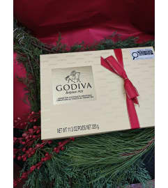 Godiva. An arrangement by KW Flowers.