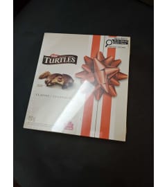 Turtles150g. An arrangement by KW Flowers.