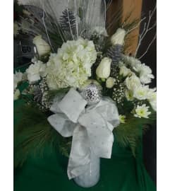 Pure Winter Elegance Bloom. An arrangement by Howard Beach Florist. Pure Winter Elegance Bloom. An arrangement by Howard Beach Florist.