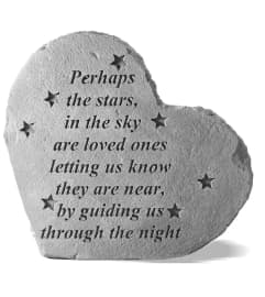Perhaps the stars in the sky memorial stone. An arrangement by Block Farms Flowers.