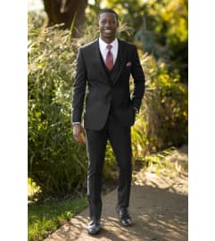 Our Most Popular Black Suit Rental $188.95. An arrangement by The Flower Box Florist.