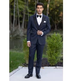 Our Most Popular Navy Tuxedo Rental $188.95. An arrangement by The Flower Box Florist.