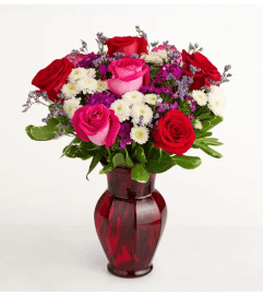 Key to My Heart in a Red Vase. An arrangement by Susana's Flowers.