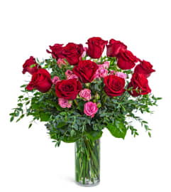 Kiss Me Dozen Roses. An arrangement by The Flower Shop of Lake Charles. Kiss Me Dozen Roses. An arrangement by The Flower Shop of Lake Charles.