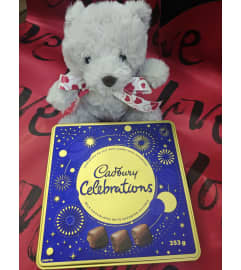 Teddy and chocolate kit. An arrangement by KW Flowers.