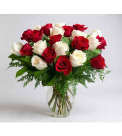 Eternal Rose Embrace. An arrangement by The Floral Basket. Eternal Rose Embrace. An arrangement by The Floral Basket.