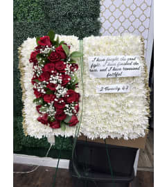 Holy Bible. An arrangement by Cielo's Floral Designs.