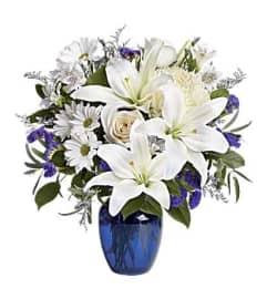 White Serenity Garden. An arrangement by Flore's Shop.