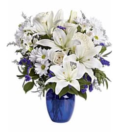 White Serenity Garden. An arrangement by Flore's Shop.
