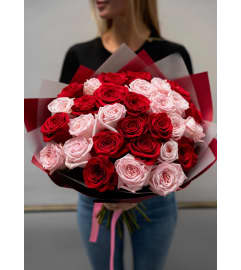 36 Red and Pink Premium Designer Wrapped Roses. An arrangement by Berlin Flower Shop.