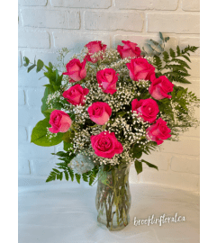 Hot Pink Dozen Roses. An arrangement by Brooklin Floral and Garden Shoppe Inc..