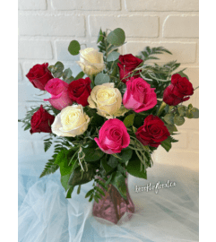 Luxe Dozen Roses and Eucalyptus. An arrangement by Brooklin Floral and Garden Shoppe Inc..