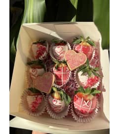 Tic Tac Toe Love. An arrangement by Bee Flowers.