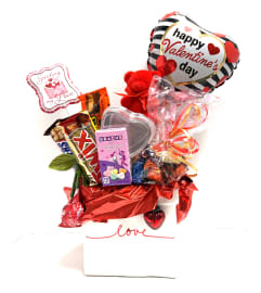 Bag of Sweetness. An arrangement by Brown Floral and Fudge.