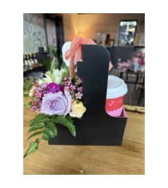 Iced Coffee and Flowers. An arrangement by Evergreen and Lily Floral Studio and Gifts. Iced Coffee and Flowers. An arrangement by Evergreen and Lily Floral Studio and Gifts.