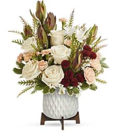 Blue Embrace Tribute. An arrangement by Flore's Shop.