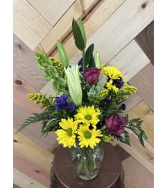 Purple Whisper Garden. An arrangement by Consider the Lilies. Purple Whisper Garden. An arrangement by Consider the Lilies.