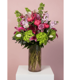 Spring Kissed Elegance. An arrangement by Blue Iris Florist. Spring Kissed Elegance. An arrangement by Blue Iris Florist.