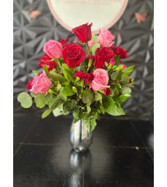Romance in Bloom. An arrangement by Hialeah Flowers.