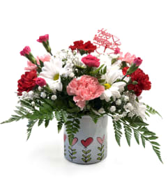 Hugs. An arrangement by Brown Floral and Fudge.