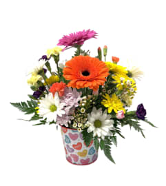 Cupid's Charm. An arrangement by Brown Floral and Fudge.