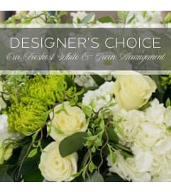 Designers Choice White and Green. An arrangement by The Greenhouse Florist. Designers Choice White and Green. An arrangement by The Greenhouse Florist.