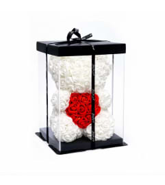White rose foam Bear. An arrangement by Lake Eola Florist.