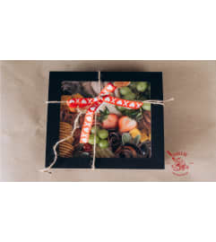 Cupid’s Charcuterie. An arrangement by La Bolsa Rosa.