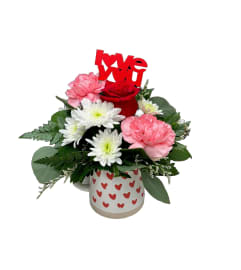 Hearts All A-flutter. An arrangement by Fendley Florists. Hearts All A-flutter. An arrangement by Fendley Florists.